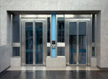 Pair of elevator doors in a residential tower lobby