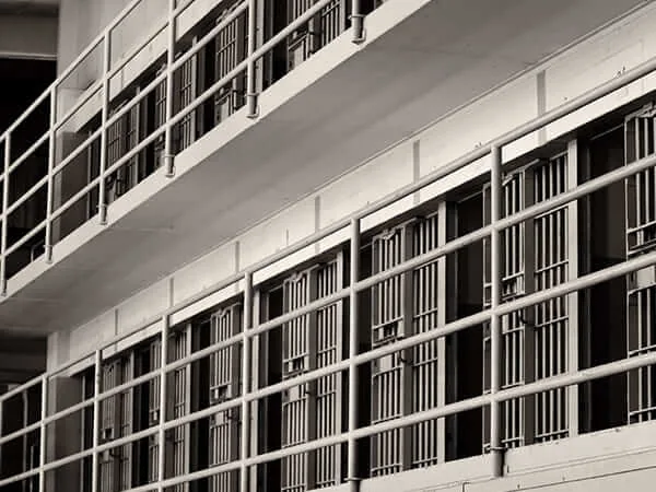 Barred cell fronts along a detention center tier